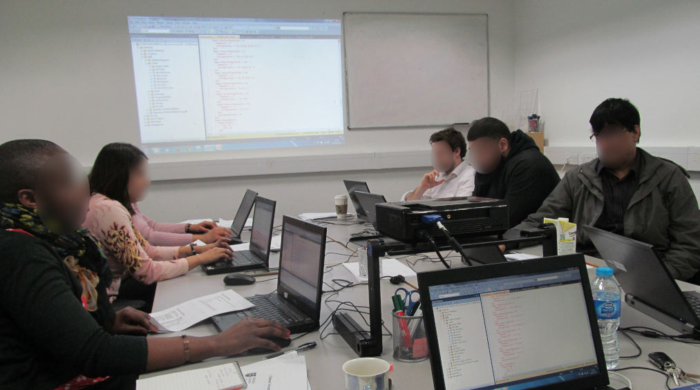 London training room with seating for eight, large screen and Wi-Fi